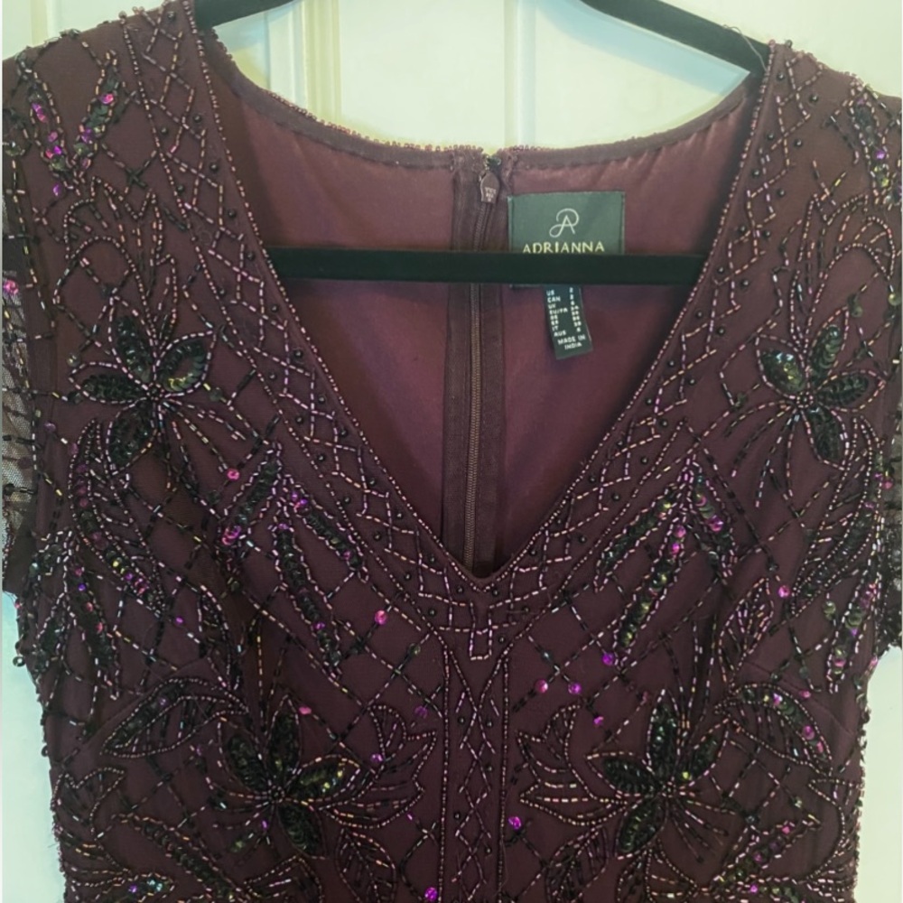 Adrianna Papell Midnight Plum Beaded and Sequins Godet Gown with Gored Skirt.
